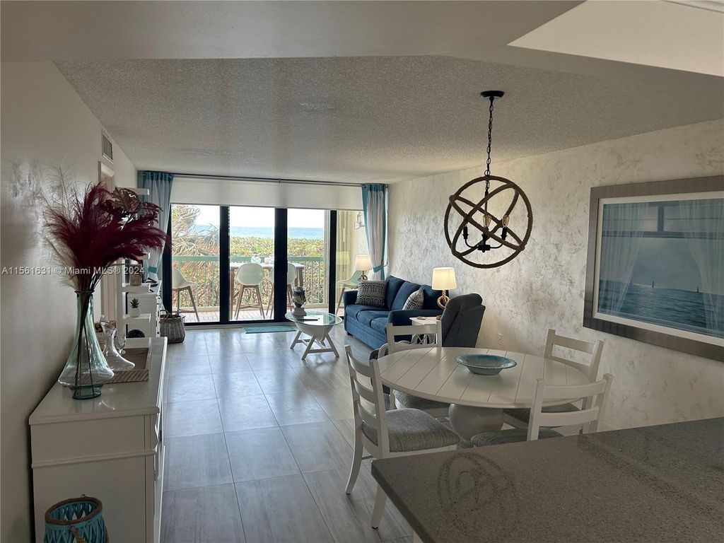 Photo of 9900 S Ocean Dr #106, Jensen Beach, FL 34957 (MLS # A11561631)