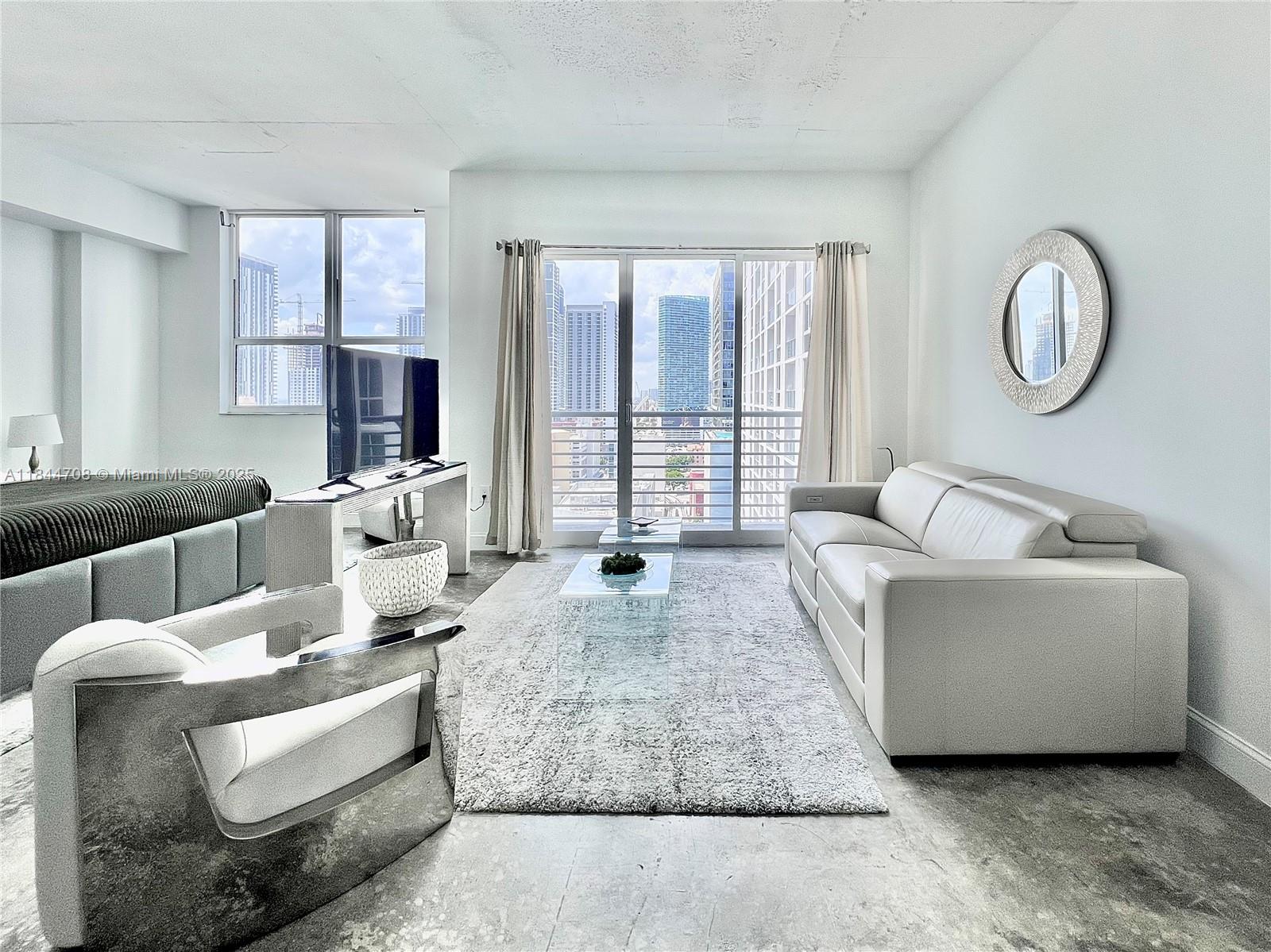Welcome to this trendy & ready-to-move-in loft at the heart of Miami! Kitchen & bathroom have undergone a complete reno boasting sleek finishes & modern appliances. Clean & elegant furnishings. Step inside & you’ll be instantly captivated by the sun-drenched open layout that provides dynamic open city views! Nice size balcony as well!
This full amenity building offers a lap pool on the ground level, a party room, a rooftop fitness center & rooftop pool to to enjoy panoramic views of the city and soak up the Florida sunshine! 24/7 Front desk & Security.
Downtown Miami is packed with world-class dining, shopping, & entertainment. Loft 2 has easy access to the city's renowned attractions, cultural hotspots & parks. Free ride to Brickell & Edgewater within minutes in the Metromover!