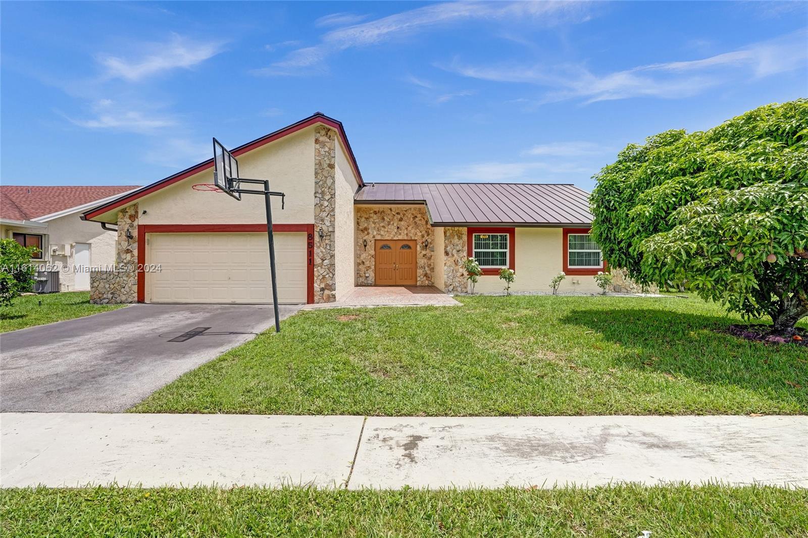 Welcome to your dream home in the beautiful city of West Lauderhill, CLOSER to SUNRISE! (VIEW ON THE MAP!) Great school zone, Spacious 3-bedroom, 2-bathroom home with a BONUS ROOM. No HOA, Prime location, just minutes away from Sawgrass. The property features a beautiful, spacious backyard with a newly resurfaced pool, perfect for entertaining and relaxation. All major ticket items have been replaced. Brand new metal roof, brand new AC unit, brand new water heater, impact windows in all bedrooms and recent renovated kitchen. The home boasts a one-of-a-kind, true wood-burning fireplace, perfect for creating cozy holiday memories.  Don’t miss out on this exceptional property. Schedule a showing today and make this beautiful house your new home!