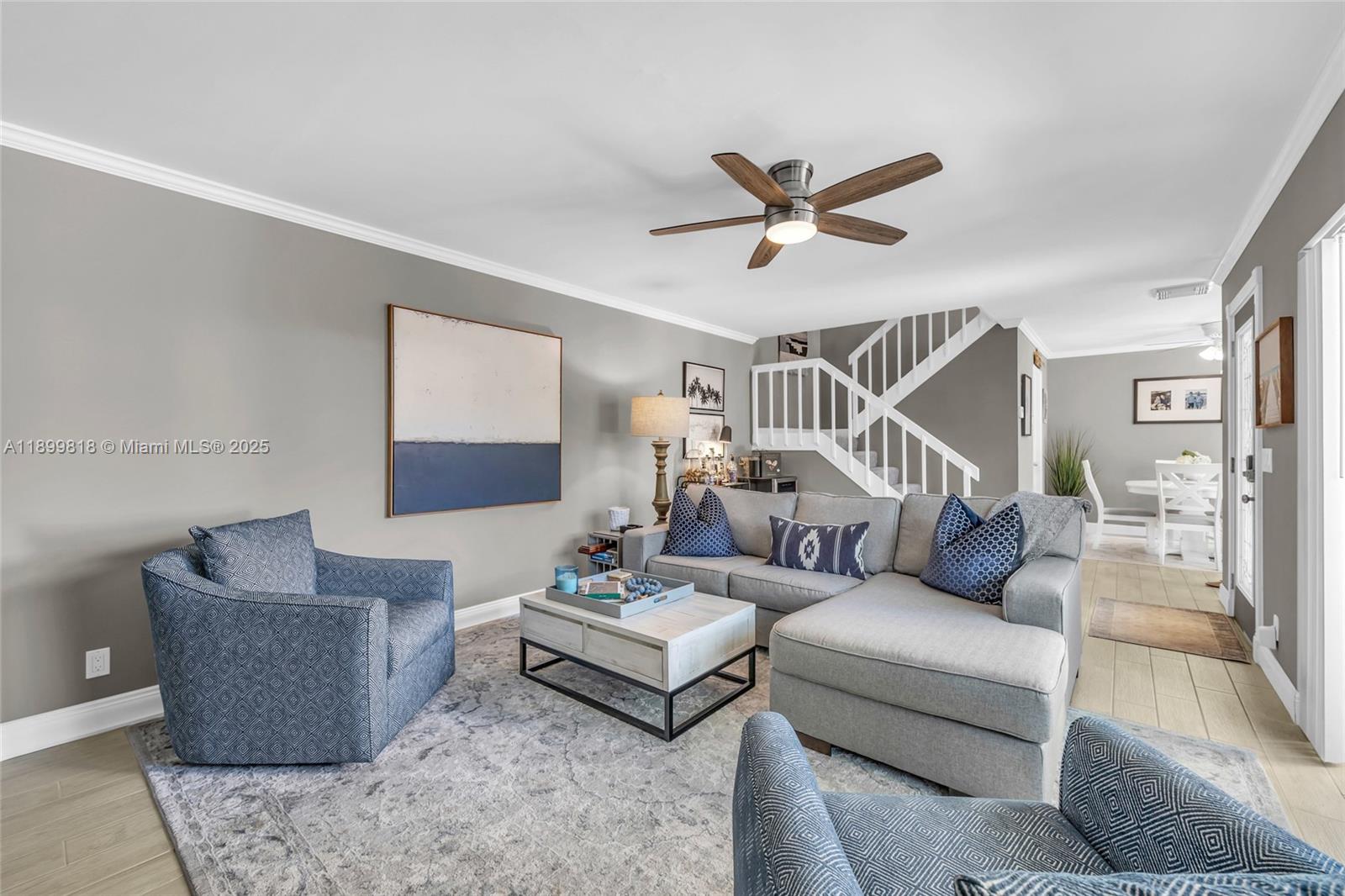 Welcome Home to this beautifully renovated Jupiter townhome walking distance to the beach. Enjoy a fresh coastal look in this bright, light filled home with an updated kitchen, flooring, crown molding, scraped first floor ceilings, paint and lighting. New custom closet systems, large bedrooms and updated baths. Excellent floorplan with an open concept eat-in kitchen dining and family room. Light and bright design extends outdoors to the large patio ready for entertaining. Relax at the community pool or beach with a short walk to Carlin Park. Pet friendly community. Rentals allowed.