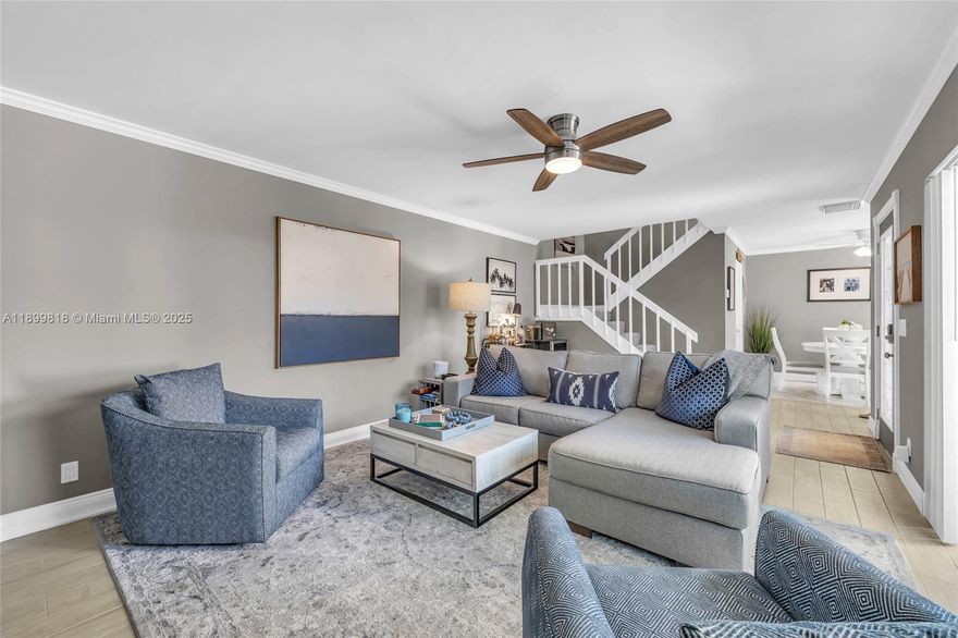 Welcome Home to this beautifully renovated Jupiter townhome walking distance to the beach. Enjoy a fresh coastal look in this bright, light filled home with an updated kitchen, flooring, crown molding, scraped first floor ceilings, paint and lighting. New custom closet systems, large bedrooms and updated baths. Excellent floorplan with an open concept eat-in kitchen dining and family room. Light and bright design extends outdoors to the large patio ready for entertaining. Relax at the community pool or beach with a short walk to Carlin Park.  Pet friendly community. Rentals allowed.