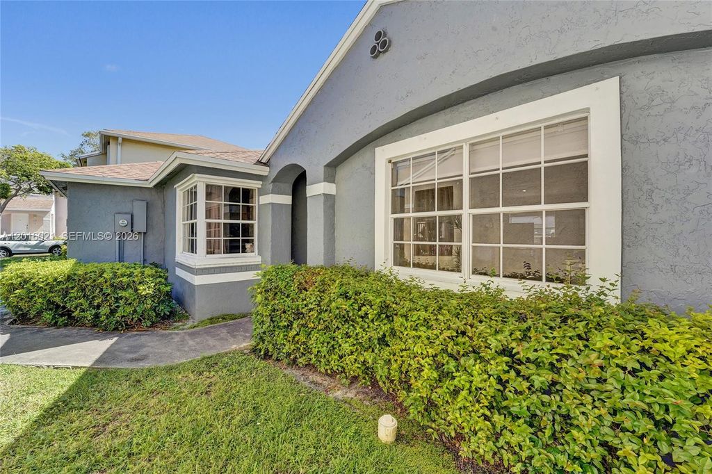 Photo of 11730 NW 12th St, Pembroke Pines, FL 33026 (MLS # A12016021)
