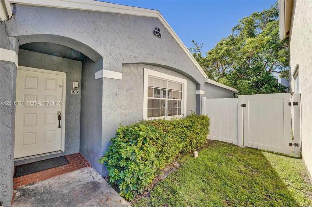 Photo of 11730 NW 12th St, Pembroke Pines, FL 33026 (MLS # A12016021)