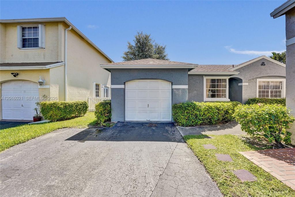 Photo of 11730 NW 12th St, Pembroke Pines, FL 33026 (MLS # A12016021)