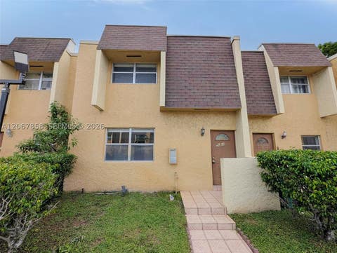 Photo of 5664 Blueberry Ct #15, Lauderhill, FL 33313 (MLS # A12067858)