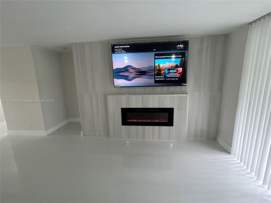 *JUST REDUCED!!* AMAZING, TOTALLY RENOVATED 2 bed/2 bath condo! This beautiful condo located in the 55+ Huntington Lane gated community has EVERYTHING NEW! This condo offers an open air concept where we can see the elegant large open kitchen overlooking the living area. Flooring is porcelain and kitchen has quartz. Unit is located on the first floor, a few steps away from the parking spot. Your own private front yard area that leads to the unit. Living room is equipped with new TV and custom wall mounted electric indoor Fireplace. Brand new flooring, mirrors, cabinets, showers, and much more! A must see in person. Plenty of cabinet and storage space. Peaceful garden view overlooking from the living area and primary bedroom. Amazing amenities and completely renovated clubhouse!