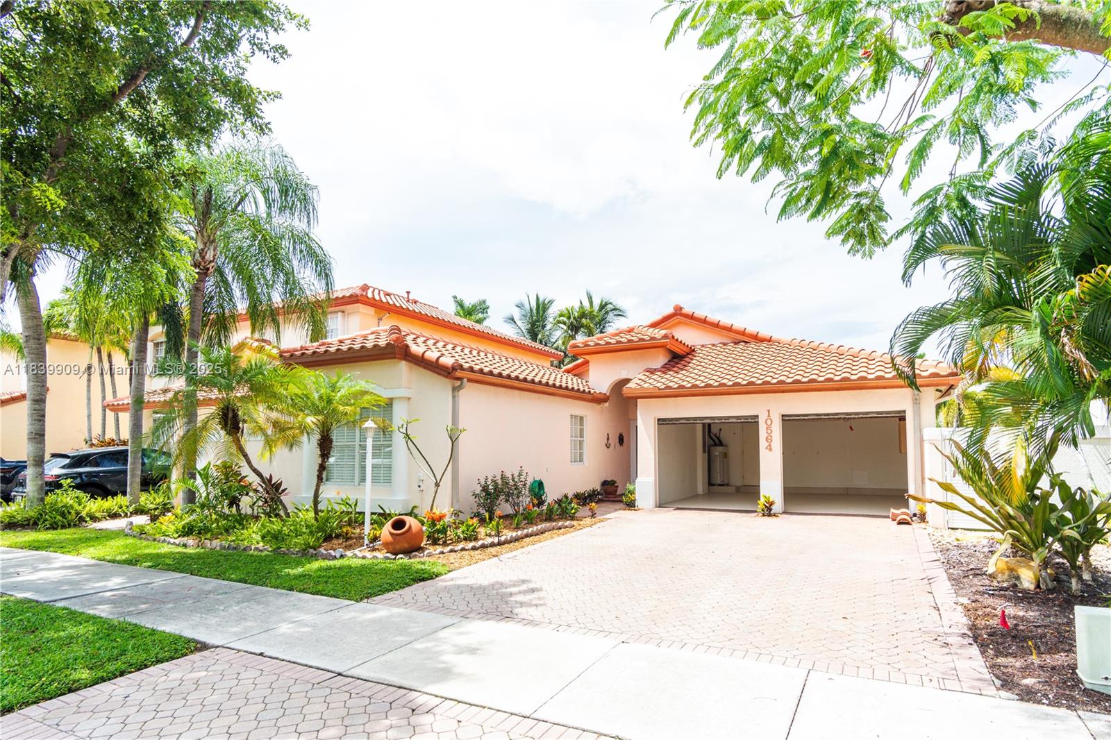 Charming one-story home in the desirable Doral Sands community within Doral Park. Original owner, roof replaced in 2021. This well-maintained property features marble floors, high ceilings, solid wood kitchen cabinets, and abundant natural light and ventilation. The spacious backyard is ideal for relaxing or entertaining outdoors. Perfect for buyers looking to downsize or families seeking access to top-rated schools and a vibrant community. Enjoy Doral Park Club amenities including pool, tennis, gym, restaurant, and spaces for events and activities. Live in the heart of Doral—close to parks, shopping, dining, and more. A lifestyle of comfort, convenience, and value awaits.