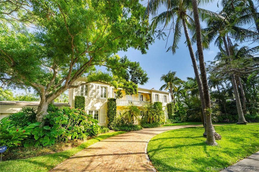 Rarely available this architecturally distinct residence by famed Architect Arthur Laidler-Jones, designer of Casa Casuarina (the former Versace Mansion), is on a large 17,160 sq. ft. double lot on the upper stretch of prestigious North Bay Road. The impressive layout features 4 bedrooms upstairs & a staff quarters downstairs. The formal living & dining rooms boast high ceilings and gorgeous architectural details found throughout. A large sunroom with French doors opens to a lush garden and pool area with portico, great for entertaining. Host guests in the 1/1 detached guest house with kitchenette. Impact windows & doors offer added security, and the 2-car garage & circular driveway provide ample parking. Just minutes from La Gorce Country Club, Fisher Park, the beach, & the best schools.