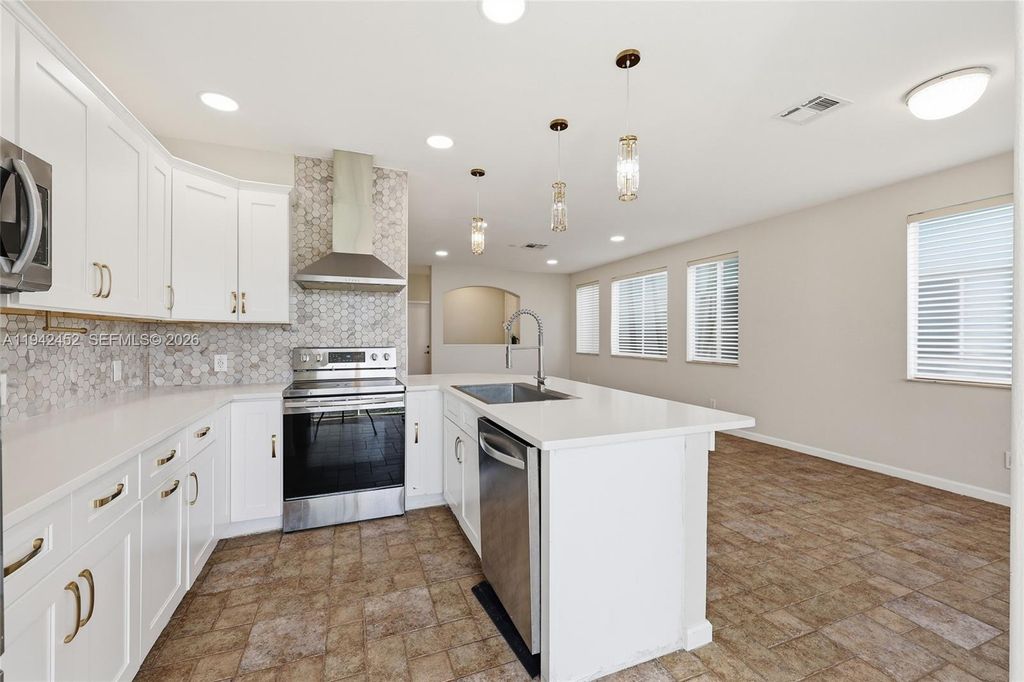 Photo of 3059 Laurel Ridge Cir, Riviera Beach, FL 33404 (MLS # A11942452)