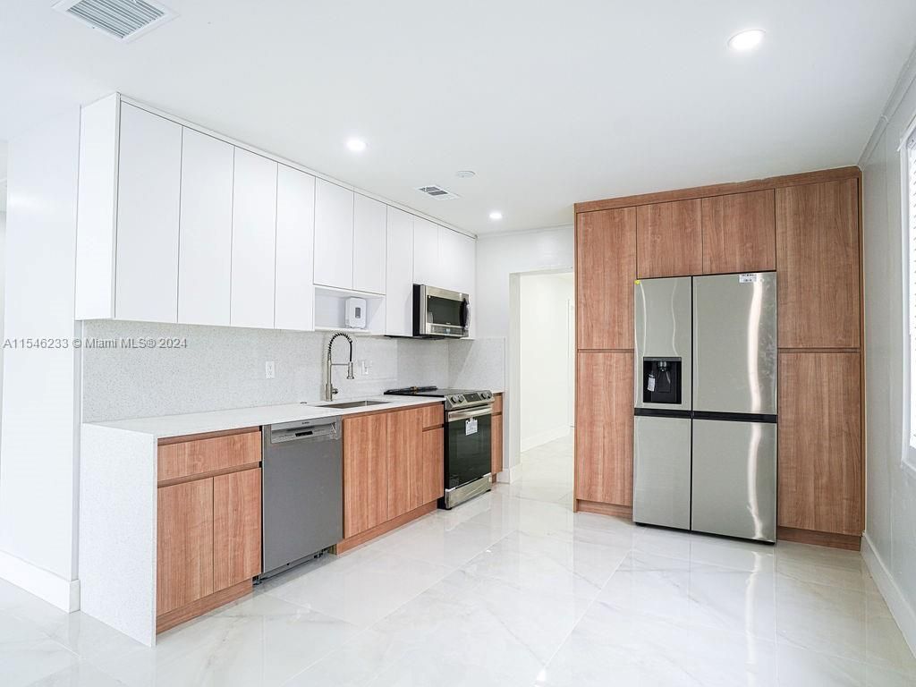 Photo of 765 W 5th St, Riviera Beach, FL 33404 (MLS # A11546233)