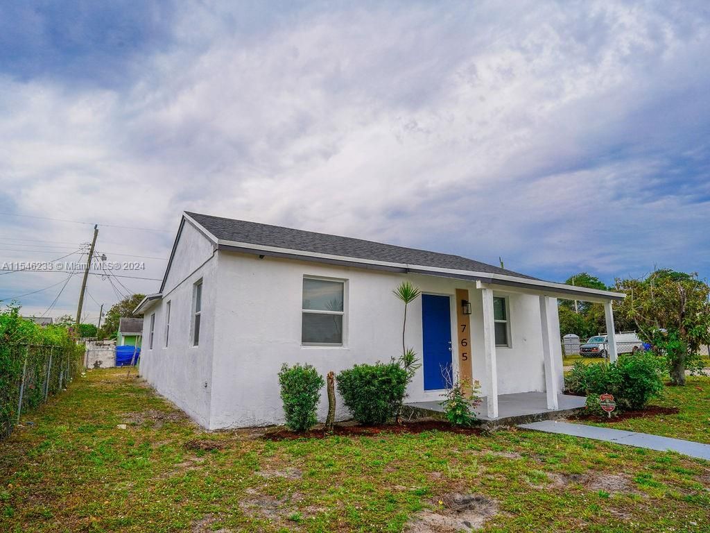 Photo of 765 W 5th St, Riviera Beach, FL 33404 (MLS # A11546233)
