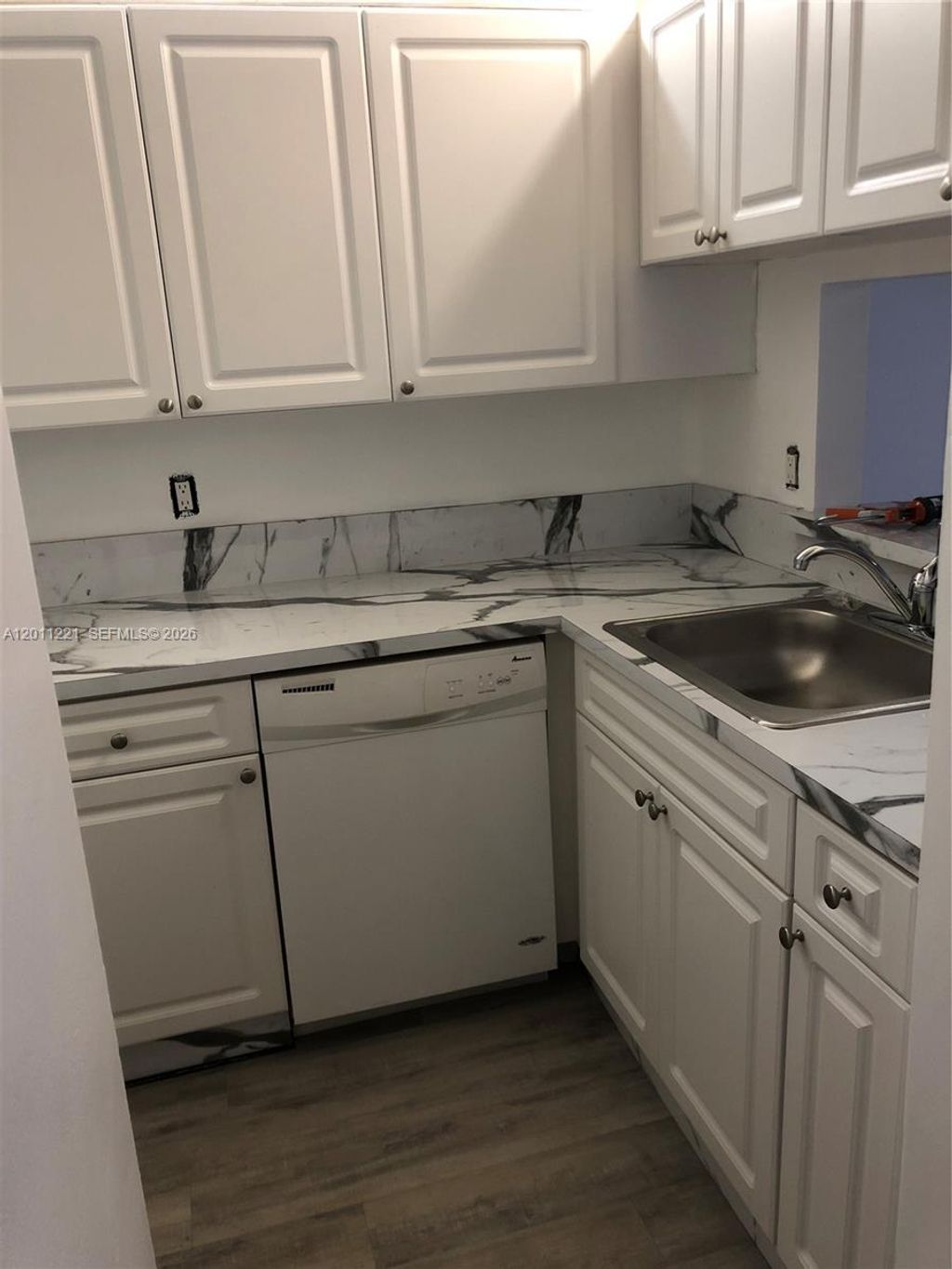 Photo of 1027 Twin Lakes Dr #28-B, Coral Springs, FL 33071 (MLS # A12011221)