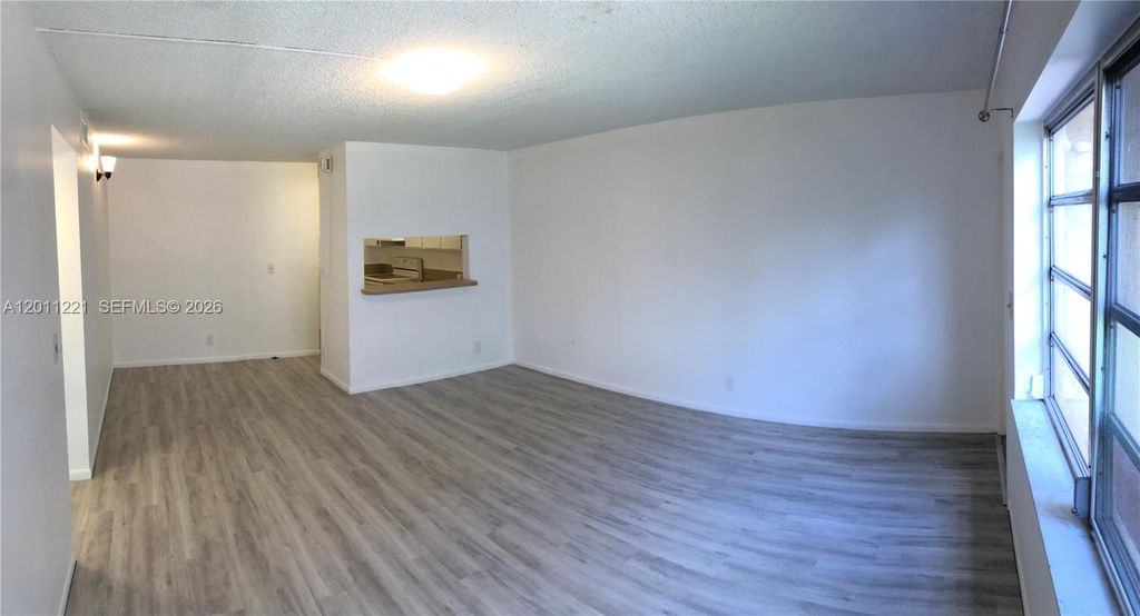 Photo of 1027 Twin Lakes Dr #28-B, Coral Springs, FL 33071 (MLS # A12011221)