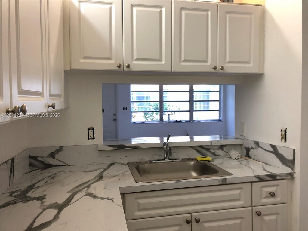 Photo of 1027 Twin Lakes Dr #28-B, Coral Springs, FL 33071 (MLS # A12011221)