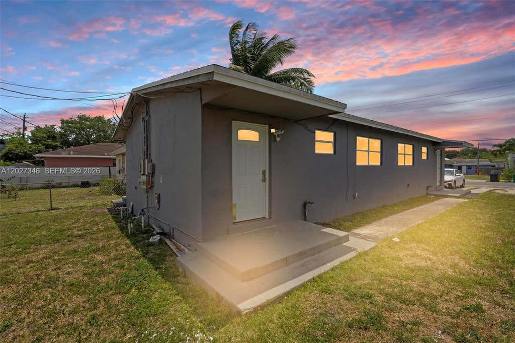 Photo of 369 Phippen Waiters Rd #1, Dania Beach, FL 33004 (MLS # A12027346)