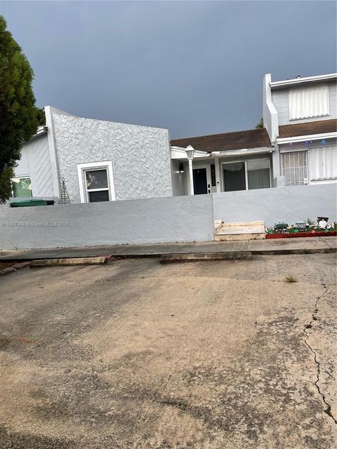 Photo of 19423 NW 53rd Pl, Miami Gardens, FL 33055 (MLS # A11807078) Photo of 19423 NW 53rd Pl, Miami Gardens, FL 33055 (MLS # A11807078)