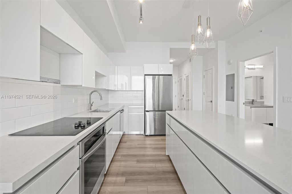 Photo of 101 Diplomat Pkwy #1705, Hallandale Beach, FL 33009 (MLS # A11974521)