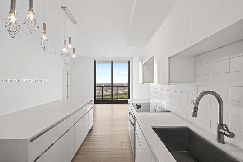 Photo of 101 Diplomat Pkwy #1705, Hallandale Beach, FL 33009 (MLS # A11974521)