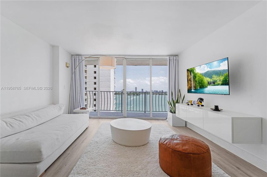 Beautifully remodeled 2-bedroom, 2-bath residence featuring stunning bay, pool and ocean views. Tasteful upgrades throughout include updated appliances and a full-size washer and dryer. Bright, spacious layout with excellent natural light. One assigned parking space included. Located in North Bay Village, a rapidly growing waterfront community with exciting new developments, dining, and lifestyle amenities. Priced to sell—ideal for end users or investors.