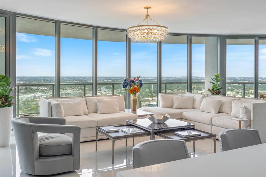 Stunning, furnished 42nd floor condo in 100 Las Olas. Enjoy luxury indoor-outdoor living in this 2,658 sq ft residence. 3 bedrooms + den, 3.5 bathrooms. Spacious open floor plan. Floor to ceiling windows, great natural light, large terraces, spectacular sunsets & river views. Professionally furnished with designer custom furniture & lighting.  Marble floors, high-end finishes. Fully equipped gourmet kitchen: European cabinets, quartz countertops top of the line appliances. Wet bar & wine cooler. Primary suite features 2 walk-in closets, luxuriously appointed bathroom. 2nd & 3rd bedrooms have ensuite baths, walk-in closets. 2nd bedroom has a private terrace. Laundry room with full size washer, dryer.  2 side by side assigned parking spaces & storage unit included.  5-star resort-style amenities: 24/7 concierge desk, rooftop pool, club room, fitness room, above Harbourwood on-site restaurant and Eddie V's.  Next to beautiful Hizuenga Park & steps to Las Olas shopping, dining & more.
