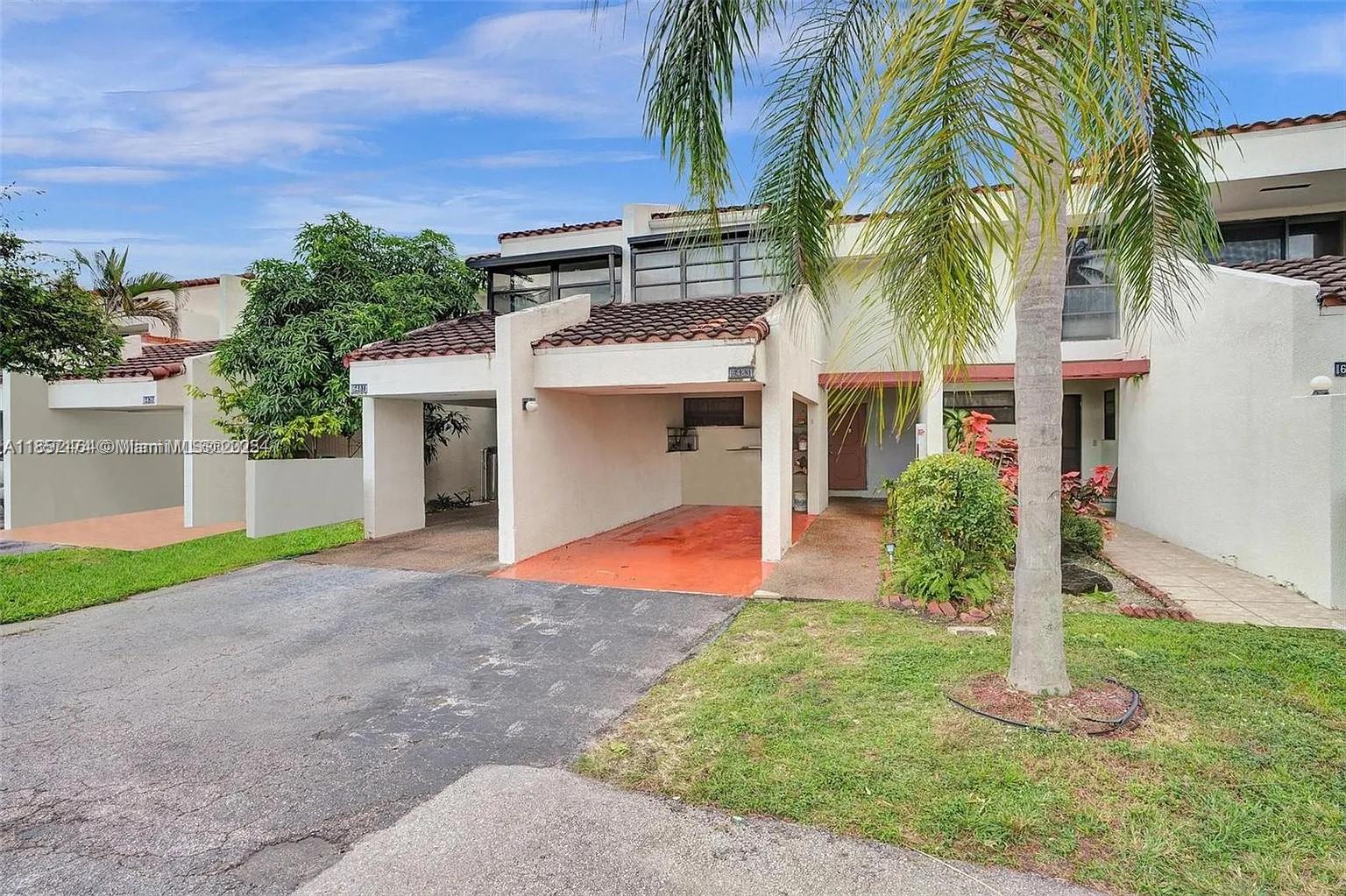 Welcome to this spacious 2 BD | 2.5 BA townhome in a desirable gated community in the heart of Lauderhill. This two-story home features newer appliances, a screened-in patio perfect for relaxing, and private balconies off both upstairs bedrooms to enjoy the Florida sunshine. The interior offers laminate wood flooring upstairs and tile floors downstairs, providing a modern look and easy upkeep. Both bedrooms are located on the second floor for added privacy, each with its own full bath. Additional perks include a one-car carport, a well-maintained community, and proximity to the Florida Turnpike for easy commuting. Just minutes from shopping, dining, and entertainment, this home is move-in ready and offers the ideal combination of comfort, convenience, and security.