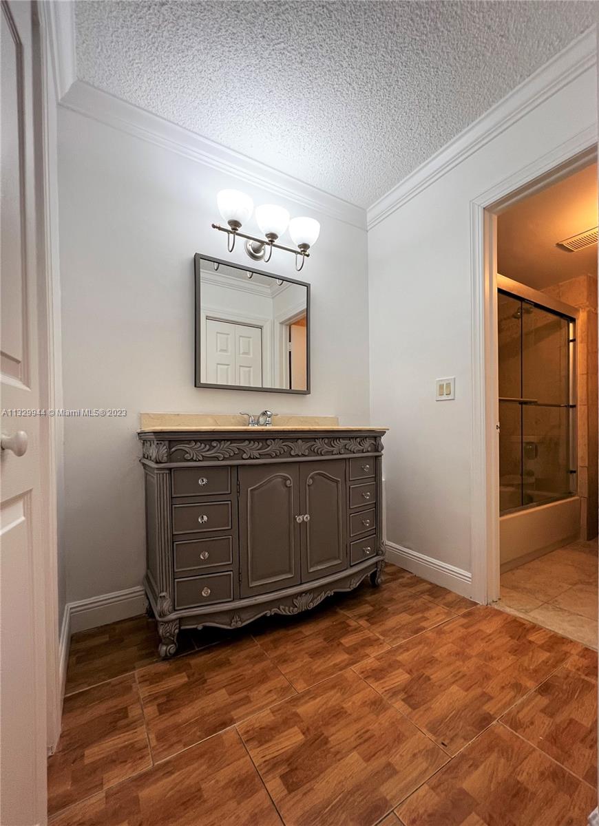 RACQUET CLUB APARTMENTS A - Residential Lease