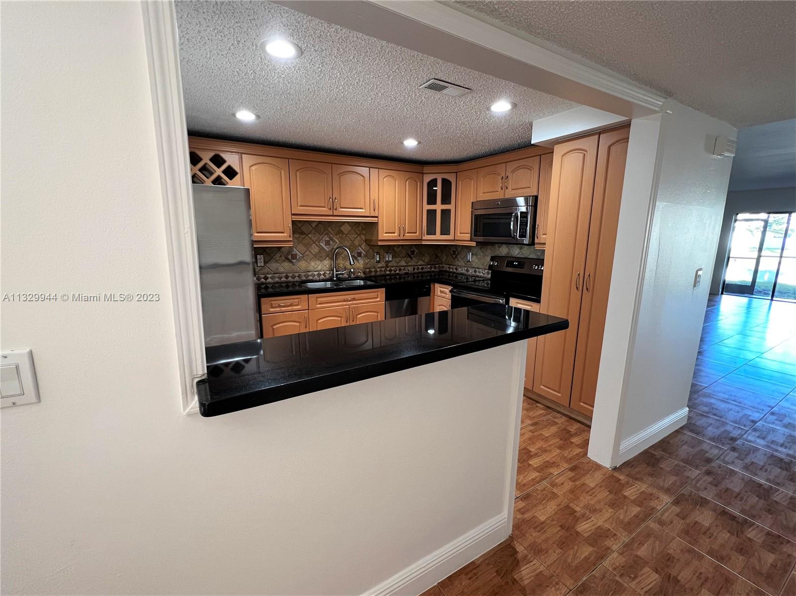 RACQUET CLUB APARTMENTS A - Residential Lease