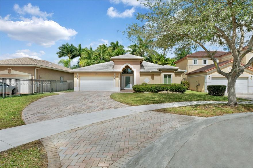 West Kendall cul-de-sac gem! Beautifully updated and rarely available 1 story 4 bedroom/3 bath split plan in quiet neighborhood steps from top schools. Modern kitchen w/ wood cabinets, granite, and stainless steel appliances. Impact windows and doors, accordion shutters still attached, and barrel tile roof sealed for extra protection. Main bedroom has volume ceilings, custom walk-in closets, spa bathroom, and large windows allowing in natural light and opening to views of the salt water pool/ patio area with built-in barbecue and jacuzzi perfect for outdoor entertaining and enjoyment. Who is ready to call this beautiful house in a peaceful neighborhood, home?