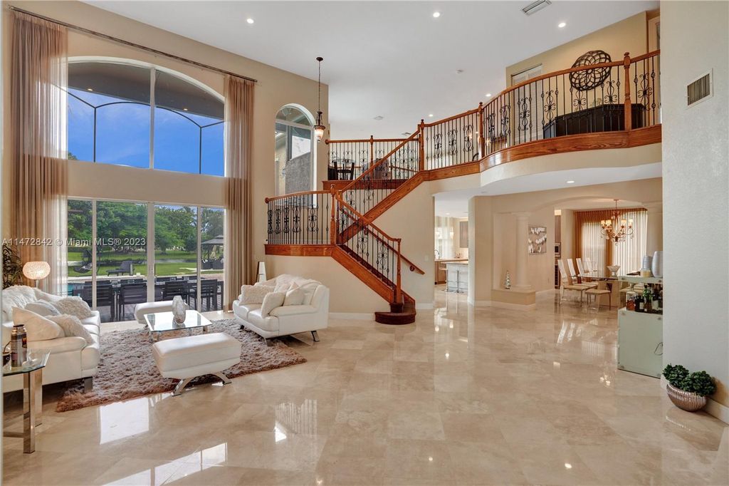 Photo of 10461 N Lake Vista Cir, Davie, FL 33328 (MLS # A11472842)