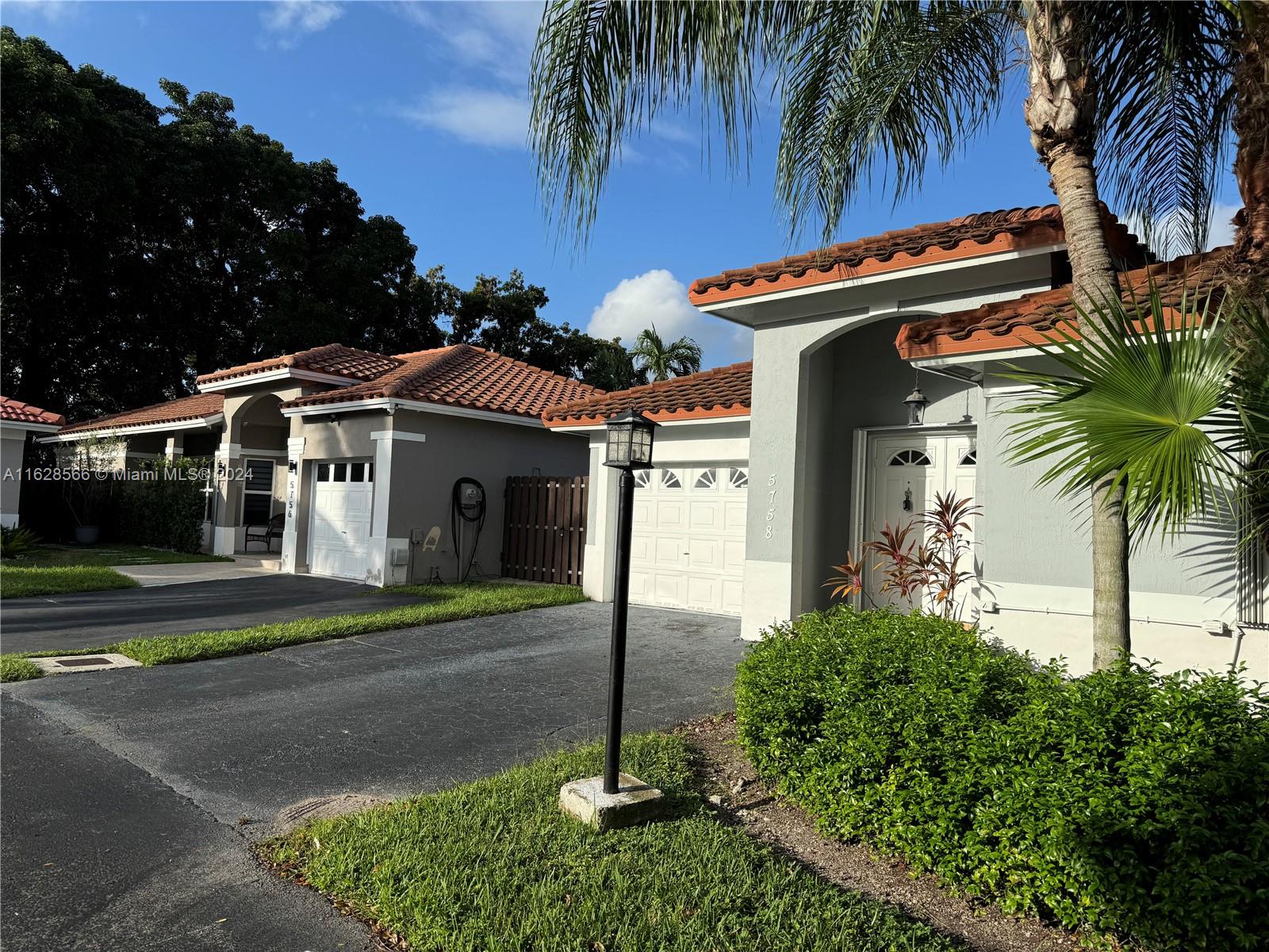 Located in the heart of Doral, this charming single corner family home features a new roof completed in October 2019, an air conditioning unit installed in 2020, and a water heater from October 2020. This beautiful one-story residence It features 3 bedrooms and 2 bathrooms, with a kitchen adorned with granite countertops and stainless steel appliances, including a 2020 washer, dryer, microwave, and oven. The home is equipped with accordion shutters for added security. Enjoy a private patio and spacious paver wrap-around backyard, accessible from both the kitchen and master bedroom.Residents can take advantage of the excellent amenities that Doral Park Country Club offers, such as a swimming pool, security services, gym, tennis courts, and children's play area.