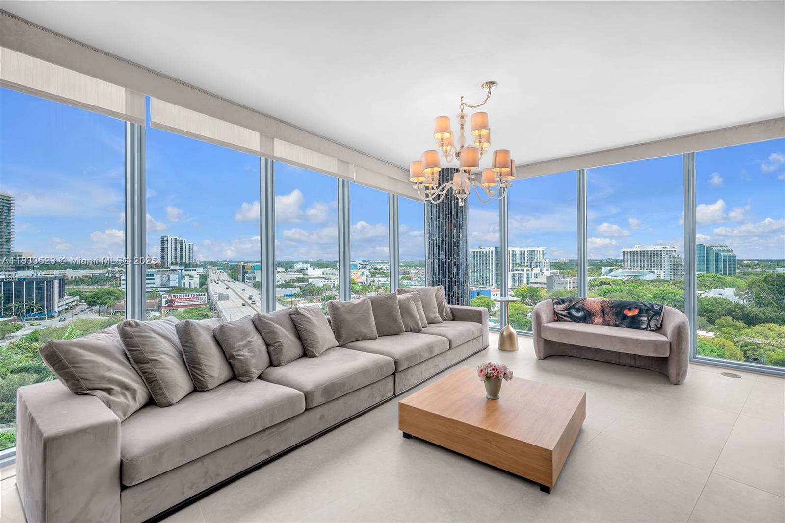 Enjoy breathtaking panoramic ocean and bay views from this beautifully updated 2 bed, 2.5 bath residence featuring a spacious split floor plan and floor-to-ceiling windows that flood the space with natural light. Brand new beautiful tile flooring has just been installed. Ample closet and storage space throughout offer functionality alongside modern style. Ideally located just minutes from Miami Beach, Brickell, and Downtown, with walkability to Midtown and the Design District. Building amenities include a cutting-edge fitness center, steam and sauna rooms, two pools, jacuzzi, BBQ area, children’s playroom, business center, valet, and more. Lobby renovation underway—great opportunity for future value growth. Includes 2 assigned parking spaces.
