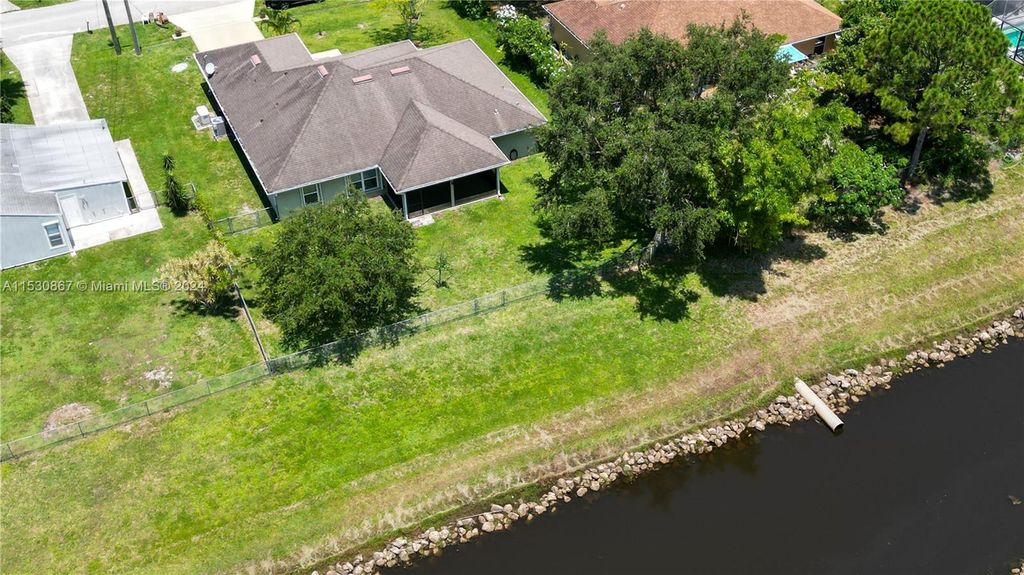 Photo of 2580 SW Monterrey Ln, Port Saint Lucie, FL 34953 (MLS # A11530867)