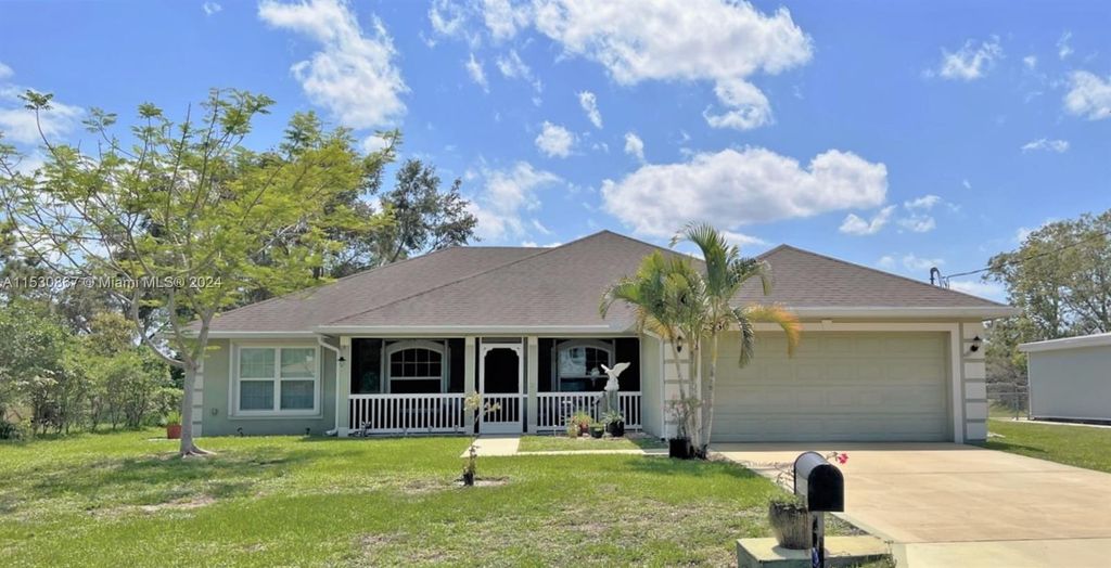 Photo of 2580 SW Monterrey Ln, Port Saint Lucie, FL 34953 (MLS # A11530867)