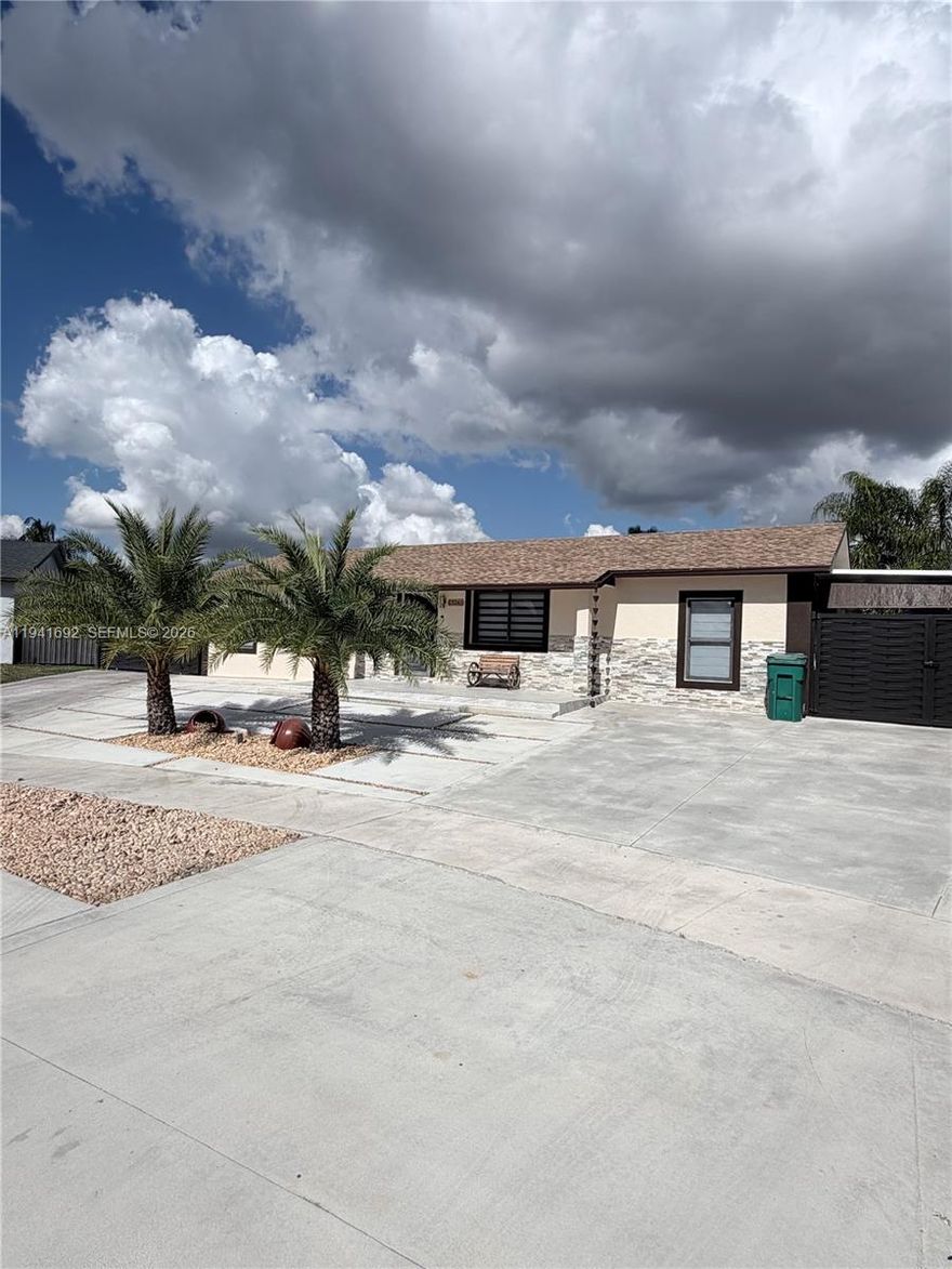 Welcome to this beautifully renovated 4-bedroom, 3-bathroom home, completely remodeled in 2023 with no detail overlooked. The modern kitchen features updated finishes and flows seamlessly into bright, open living spaces, perfect for everyday living and entertaining.
All bathrooms have been fully upgraded with contemporary design and quality fixtures. Major improvements include a new roof, new A/C system, and a newly paved driveway, offering peace of mind for years to come.
Step outside to enjoy the thoughtfully designed outdoor living area, complete with a pergola and outdoor kitchen, ideal for gatherings and relaxing year-round.
This move-in-ready home combines style, comfort, and major system upgrades, an exceptional opportunity you don’t want to miss.