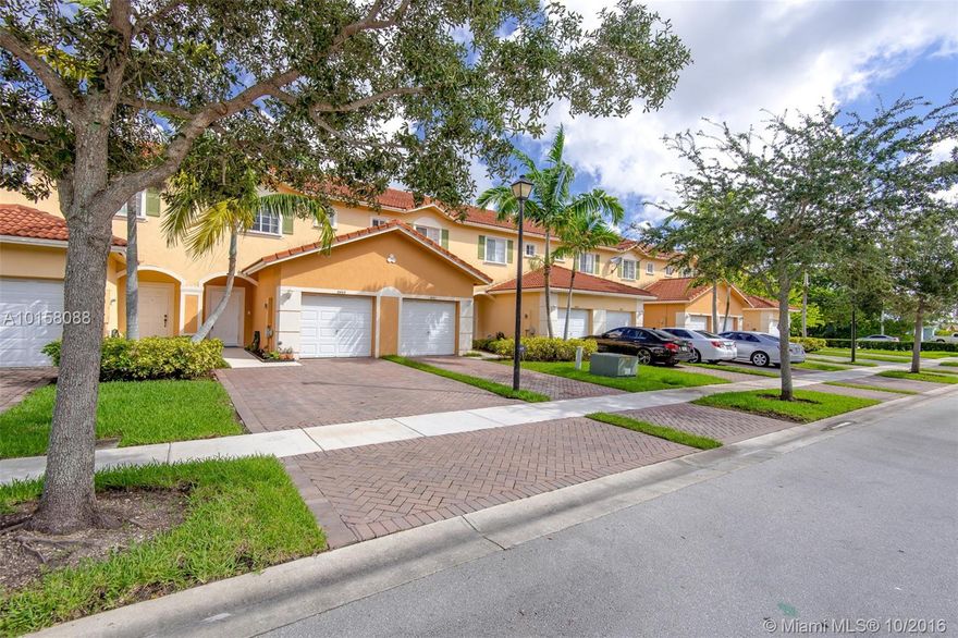 FABULOUS MEDITERRANEAN STYLE  2 BEDROOM / 2.5 BATHROOM + LARGE DEN TOWNHOME WITH 1 CAR GARAGE LOCATED IN WEST TAMARAC. PROPERTY FEATURES OPEN FLOOR PLAN WITH SPACIOUS LIVING / DINING AREA THAT LEADS OUT TO A SCREENED PATIO WITH NO NEIGHBORS BEHIND. LAMINATE WOOD FLOORING DOWNSTAIRS & BRAND NEW CARPET UPSTAIRS, STAINLESS STEAL APPLIANCES, & FRESHLY PAINTED IN NEUTRAL COLORS. LOW HOA FEES !! GREAT LOCATION, MINUTES TO GREAT SHOPPING / DINING, MAJOR HIGHWAYS, GOOD  SCHOOLS & PARKS. MOVE IN CONDITION !!