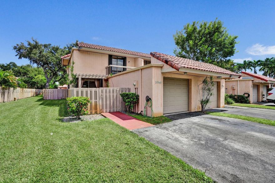 Corner Beautifully updated and spacious 2BR, 2.5BA Townhome with 2,070 sq ft of living space plus a 1-car garage, located in the sought-after Golfwood community of the California Club. This bright unit features a remodeled kitchen with quartz countertops and new stainless steel appliances, a luxurious master bathroom with dual sinks and a jacuzzi tub, and fresh interior paint. Additional highlights include hurricane shutters, a brand-new roof, and flexible garage space that can be used as a third bedroom or office. Enjoy parking for up to 4 vehicles directly in front of the unit. Ideally situated west of I-95, near major highways, Aventura Mall, Winn-Dixie, and multiple shopping plazas.  this townhome offers comfort, convenience, and versatility in one of Miami’s most desirable areas.