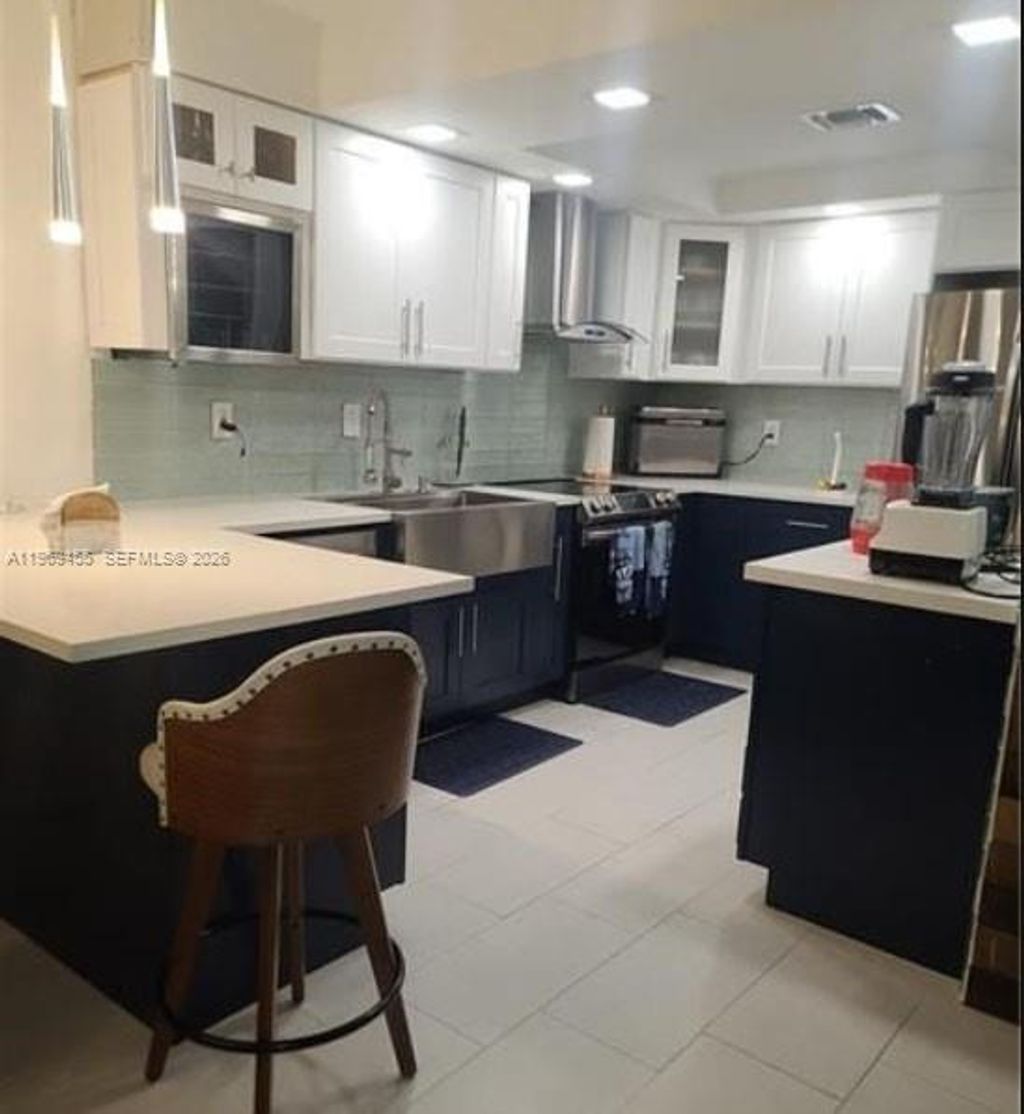 Photo of 39 Ann Lee Ln #39, Tamarac, FL 33319 (MLS # A11969455)