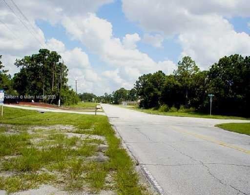 Photo of 1868 SW California Blvd, Port Saint Lucie, FL 34953 (MLS # A11376611)
