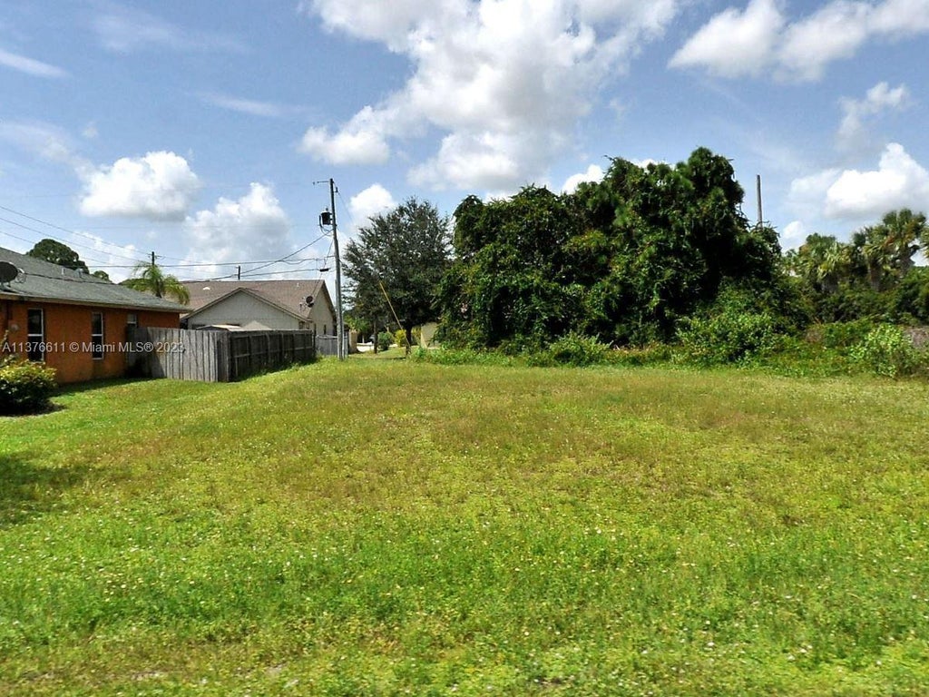 Photo of 1868 SW California Blvd, Port Saint Lucie, FL 34953 (MLS # A11376611)