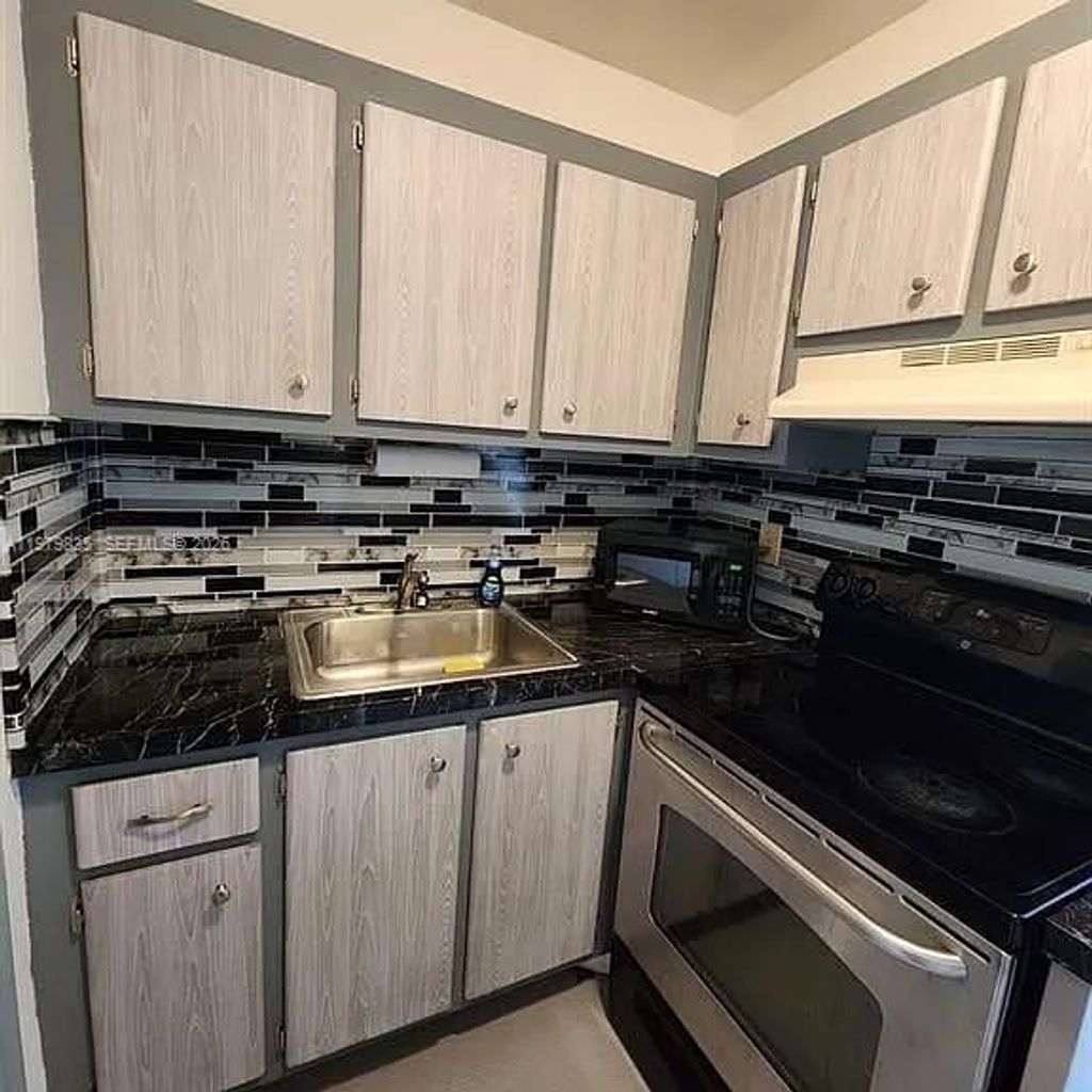 Photo of 1851 NE 62nd St #610, Fort Lauderdale, FL 33308 (MLS # A11979835)