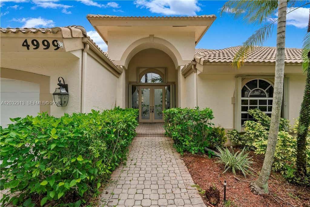 Photo of 4999 Chardonnay Dr, Coral Springs, FL 33067 (MLS # A12032913)