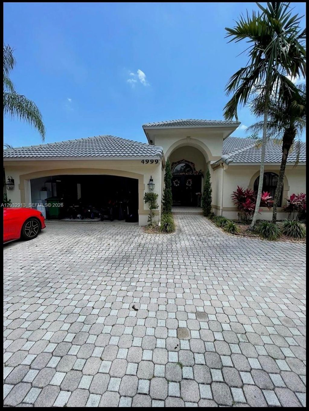 Photo of 4999 Chardonnay Dr, Coral Springs, FL 33067 (MLS # A12032913)
