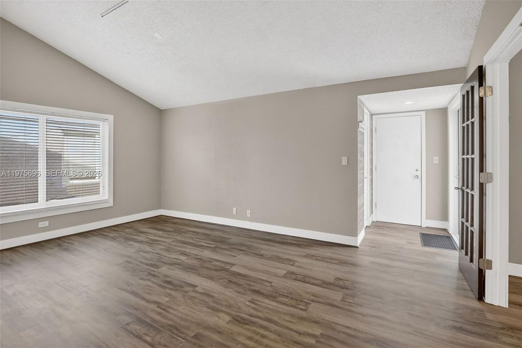 Photo of 11120 NW 26th Pl, Sunrise, FL 33322 (MLS # A11975696)