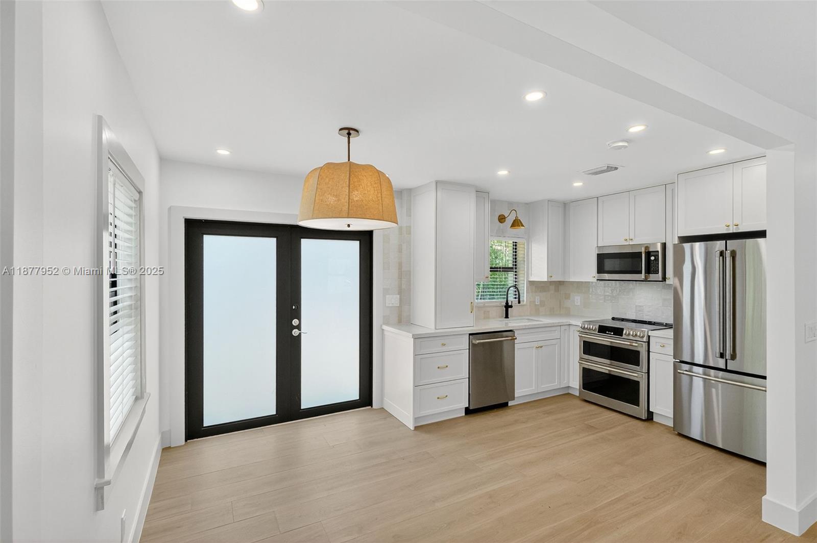 Welcome to this beautifully remodeled 2 bedroom, 2 bathroom single family home in the heart of Coral Gables. This residence has been completely renovated from top to bottom, featuring brand new flooring, a modern kitchen with new cabinetry and appliances, updated bathrooms, custom closets, and impact windows throughout. Every detail has been carefully upgraded to combine style, comfort, and peace of mind. Enjoy a spacious layout with abundant natural light, a private backyard, and charming curb appeal in a highly desirable location. Just minutes from Miracle Mile, top-rated schools, parks, and dining. Move-in ready be the first to enjoy this fully updated Coral Gables home!