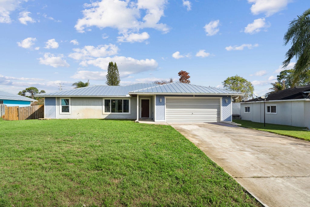 Photo of 249 SE Todd Avenue, Port St Lucie, FL 34953 (MLS # R11168596)