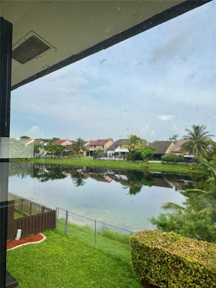 Top of the line remodeled Townhome at the end of a quiet cul-de-sac in the heart of Kendall. LAKE VIEWS ALL AROUND. New Kitchen with Stainless Steel appliances, modern ceramic tiles on first floor and laminate on second. Accordion Shutters. Covered backyard. Security Patrol. Just minutes from Miller Square Shopping Center, dining, schools and major roads.