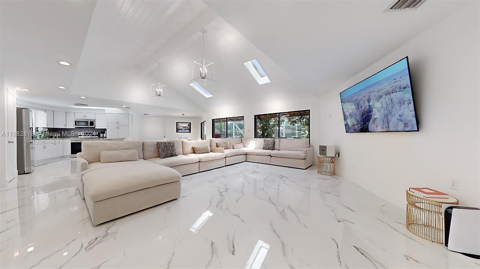 Charming 1.2 Acre Ranch Pool Home in South Redlands. This beautifully updated ranch-style home is perfect for entertaining & enjoying the serene surroundings. With an inviting split floor plan & abundant natural light, every room offers views & access to the pool & patio area. Offering Spacious Living with open concept living/dining/great room ideal for gatherings. The ample primary bedroom with walk-in closets & a luxurious ensuite bathroom offers a private retreat. The screened patio covering the pool & a wrap-around deck is perfect for enjoying your outdoor oasis & hosting family & friends. Situated in a prime location, walking distance to "Robert is Here" & just a short drive to the Florida Keys. Roof is from 2015 & AC from 2018