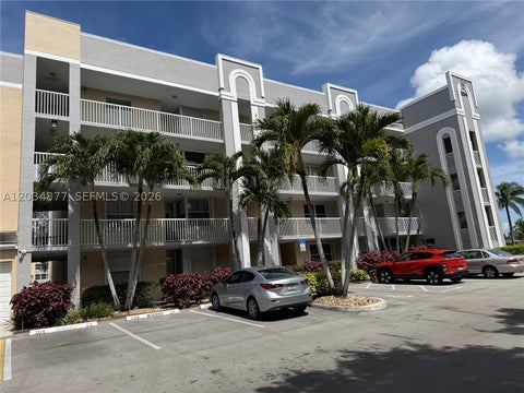 Photo of 10312 NW 24th Pl #106, Sunrise, FL 33322 (MLS # A12034877)
