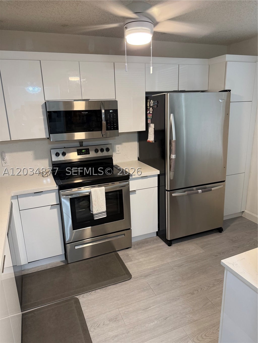 Photo of 10312 NW 24th Pl #106, Sunrise, FL 33322 (MLS # A12034877)