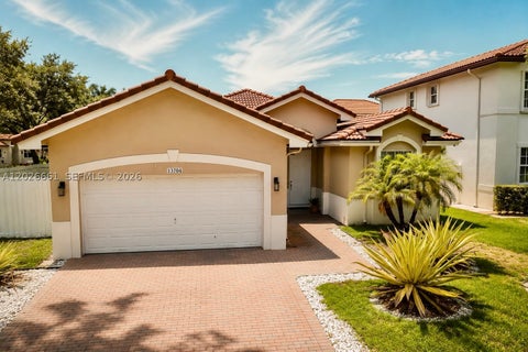 Photo of 13704 SW 31st St, Miramar, FL 33027 (MLS # A12026661)